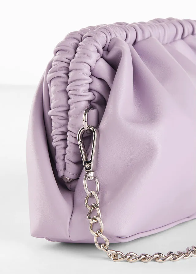 Bolso clutch con correa intercambiable claro