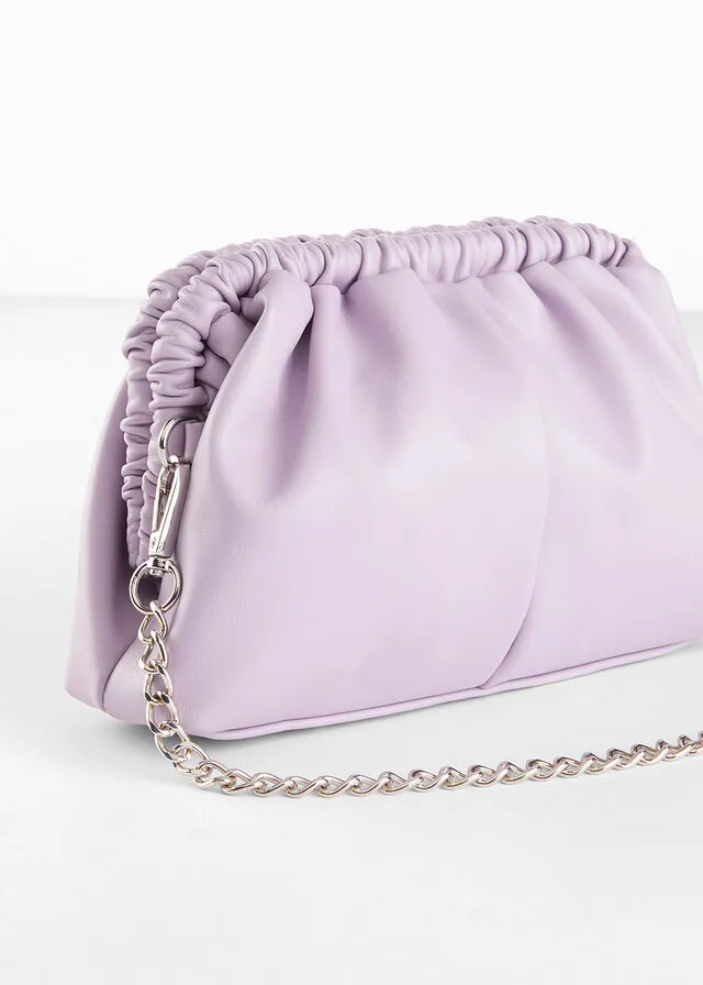 Bolso clutch con correa intercambiable claro